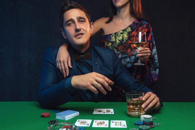 Live Baccarat table at agenolx slot with croupier and card shoe
